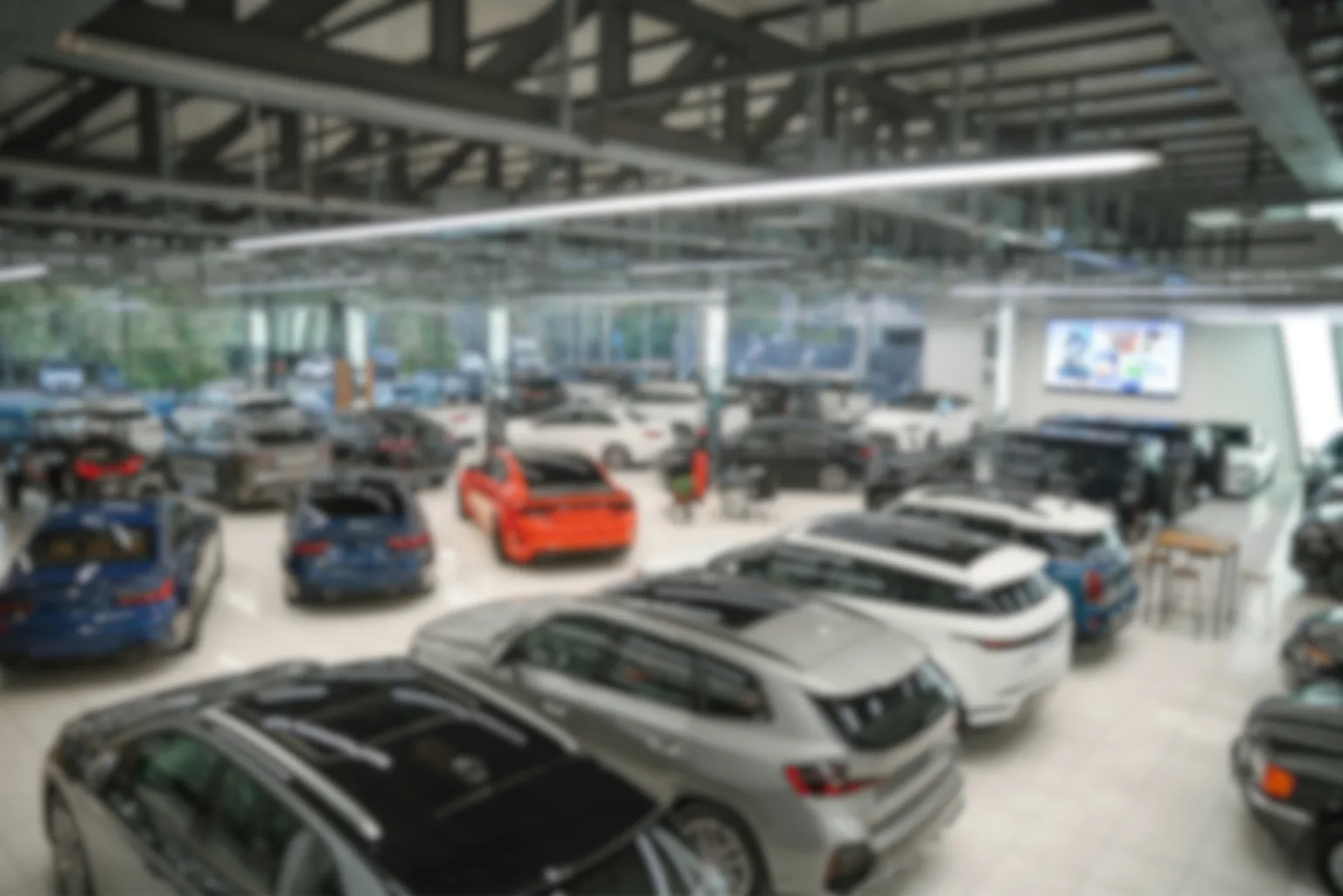 New vehicles on a dealership showroom floor